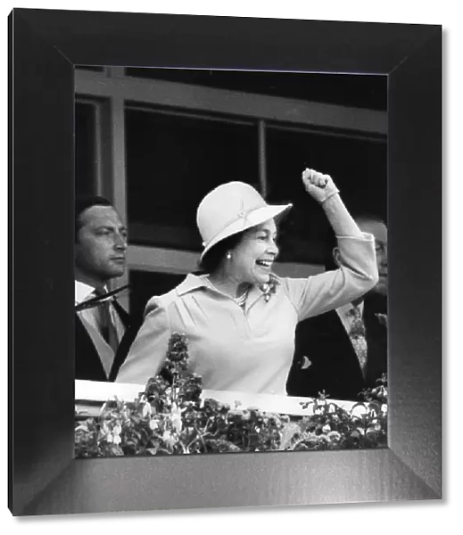 Queen Elizabeth II celebrates a win at the Derby