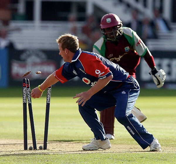 Fidel Edwards is run out by England's Paul Collingwood