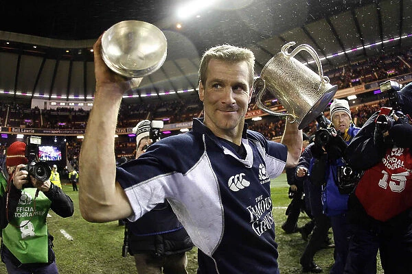 Scotland's Chris Paterson holds the Calcutta cup at Murrayfield