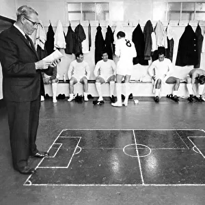 Luton Town FC manager George Martin with players in the dressing room 1966