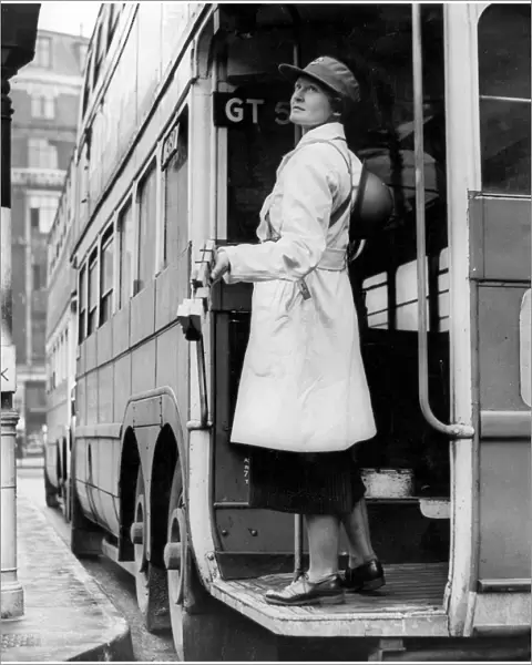 Woman bus conductor in wartime