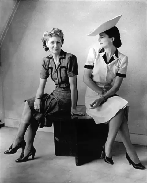 Two models wearing Utility dresses