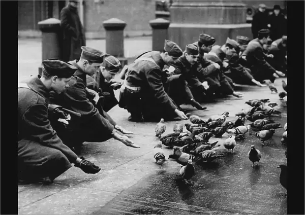 American troops feeding pigeons in Trafalgar Square, 1942