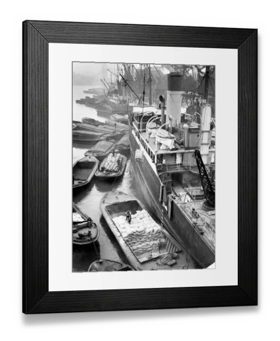 Framed Print : A steamer unloading in London docks Framed Print : A steamer unloading in London docks