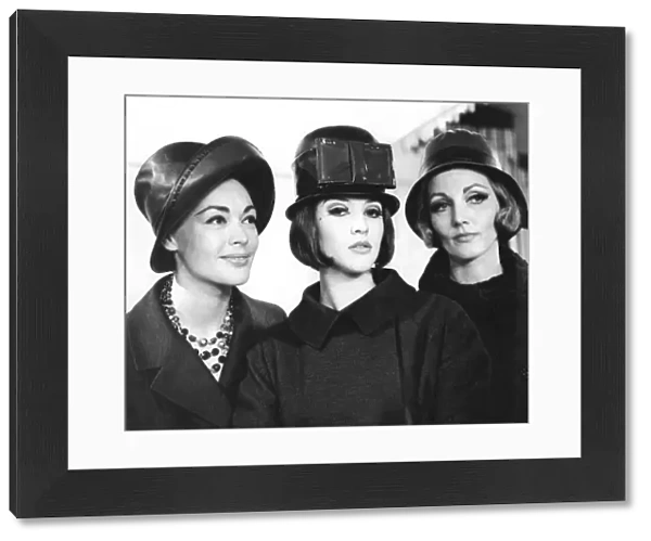Trio of models wearing leather hats