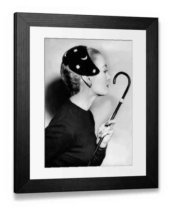 Framed Print : Model wearing hat with stars and moon design