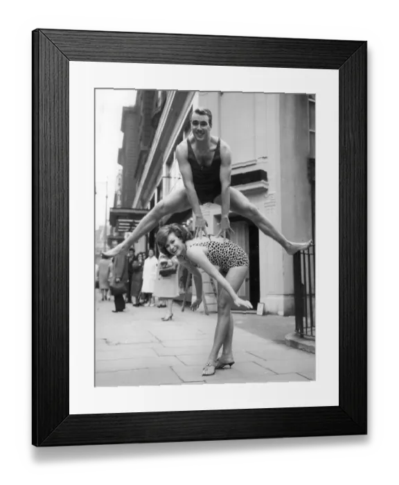 Framed Print : Sixties swimwear models play leapfrog Framed Print : Sixties swimwear models play leapfrog