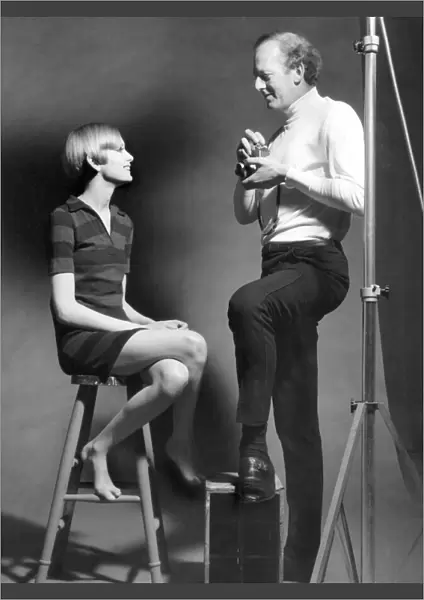 Twiggy and photographer John Cowan during a photo-shoot at his s