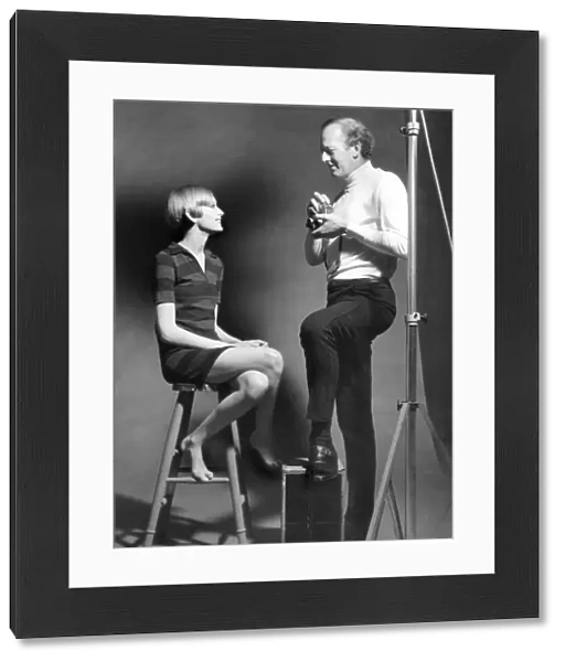 Twiggy and photographer John Cowan during a photo-shoot at his s