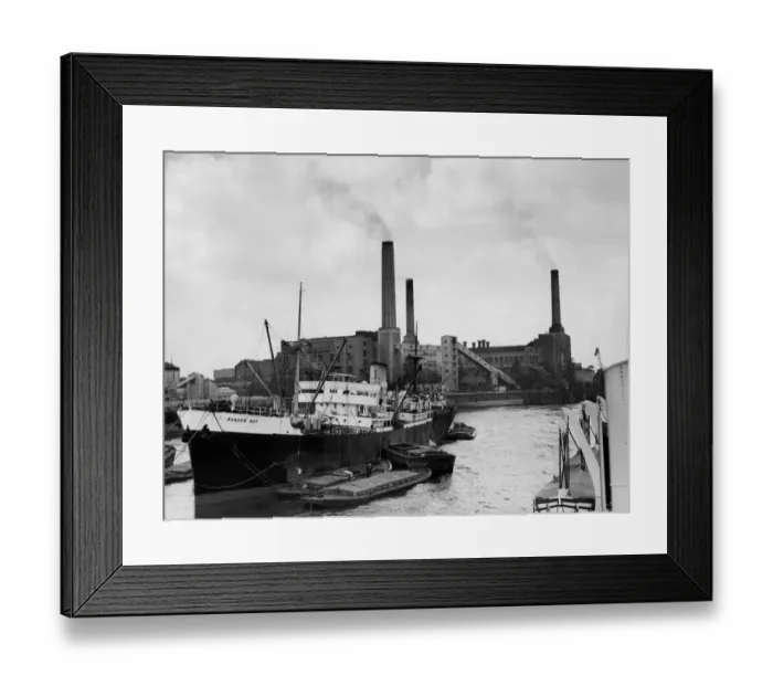 Framed Print : Deptford Power Station seen from the river with cargo steamer B Framed Print : Deptford Power Station seen from the river with cargo steamer B