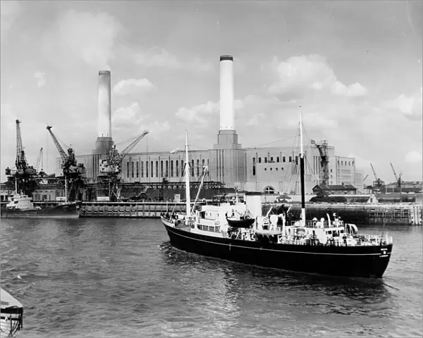 Blackwall Power Station with Trinity house vessel Vestal in foreground