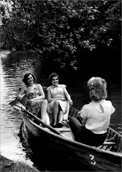 Boating on the lake at Calderstones Park, Liverpool, 1952. The l