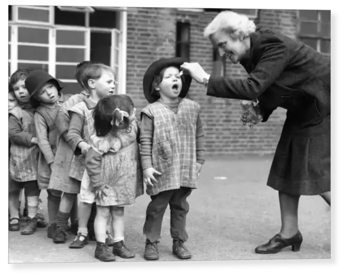 Print : Open wide. Young children at the Greek Road Nursery Day School in Deptford Print : Open wide. Young children at the Greek Road Nursery Day School in Deptford