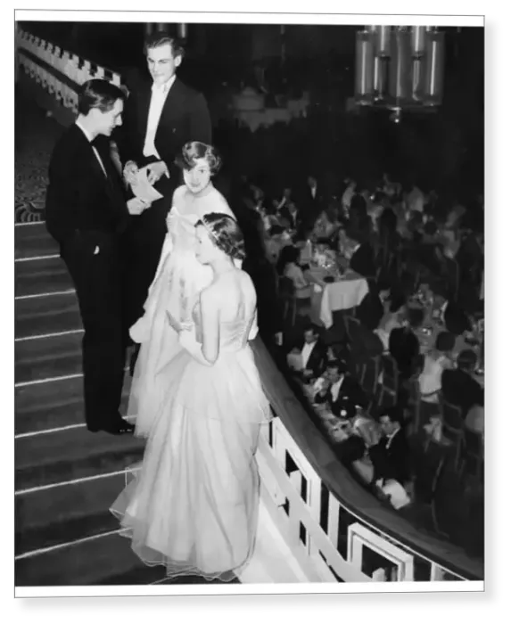 Print : Debutantes and their escorts chat on the stairs at Queen Charlot Print : Debutantes and their escorts chat on the stairs at Queen Charlot