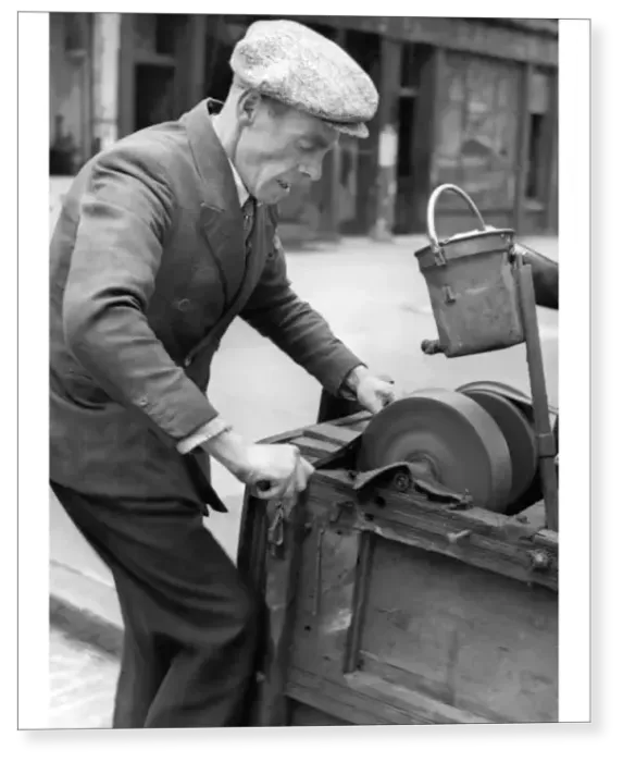 Print : A knife grinder at work, 1946 Print : A knife grinder at work, 1946
