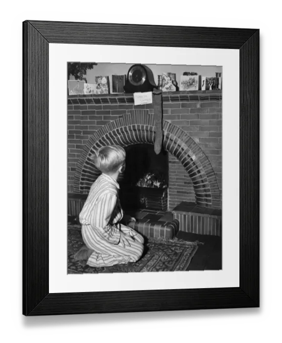 Framed Print : Fireside stocking, 1954 Framed Print : Fireside stocking, 1954