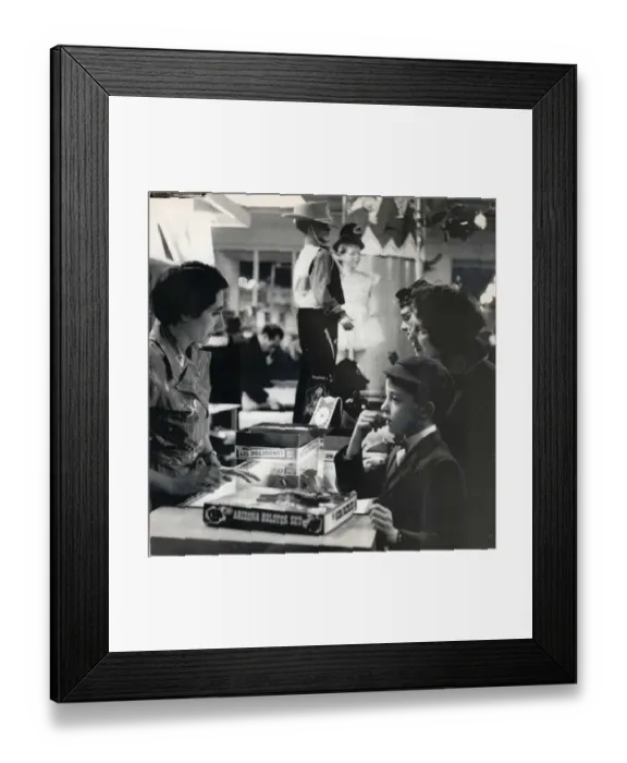 Framed Print : Boy in a toy shop 1959