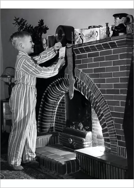 Hanging up his stocking, 1954