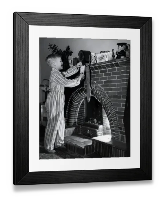 Framed Print : Hanging up his stocking, 1954 Framed Print : Hanging up his stocking, 1954