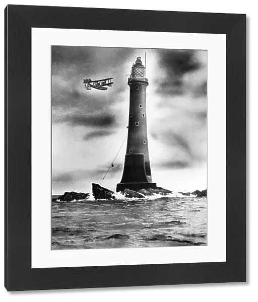 Eddystone lighthouse, with plane flying past