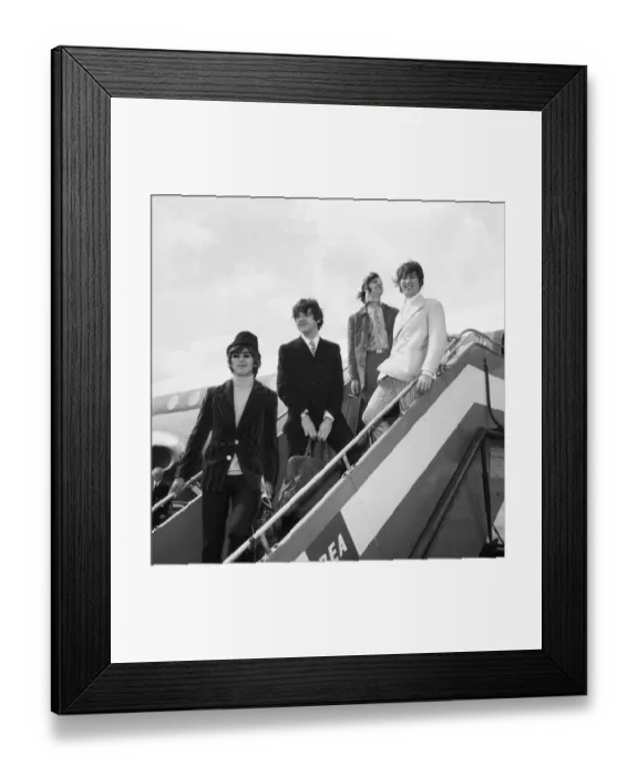 Framed Print : The Beatles at London Airport to fly out to Germany for a brief
