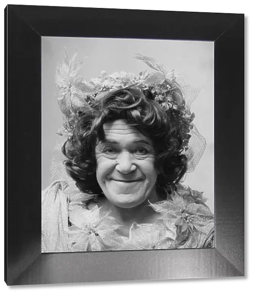 Peter Butterworth, actor, dressed as the Dame, for pantomime, Dick Whittington