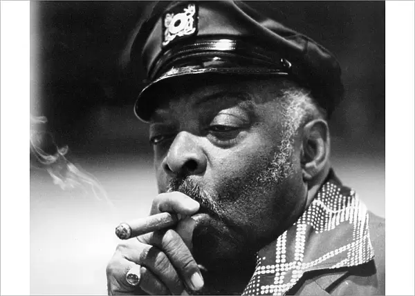 Count Basie smoking a cigar