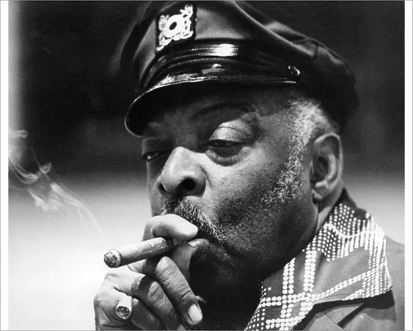 Count Basie smoking a cigar