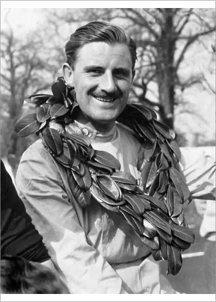 Graham Hill with winners garland 1963