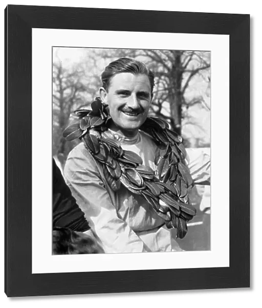 Graham Hill with winners garland 1963
