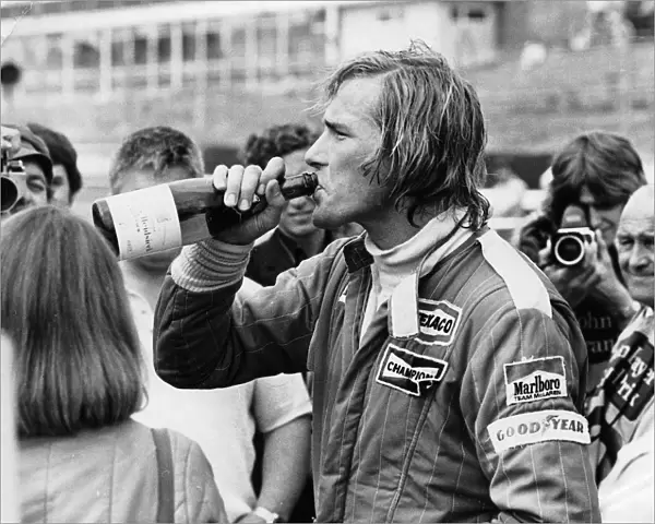 James Hunt swigging champagne