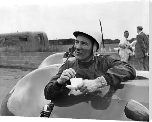 Stirling Moss has a cup of tea