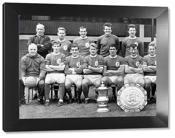 Liverpool F. C. in 1965 with the FA Cup and the Charity Shield