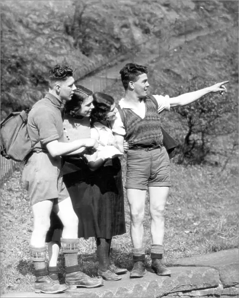 Hikers studying a map