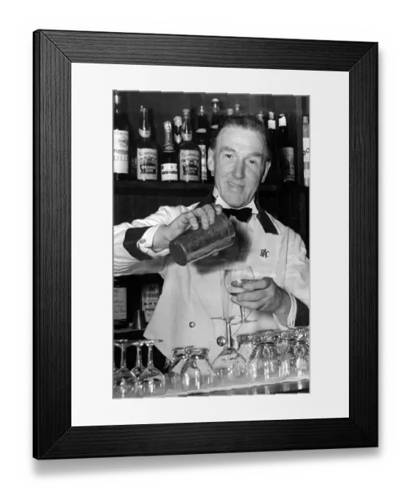 Framed Print : Barman mixing a cocktail Framed Print : Barman mixing a cocktail