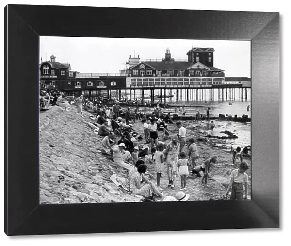Holidaymakers on the beach by Bognor Regis pier 1935