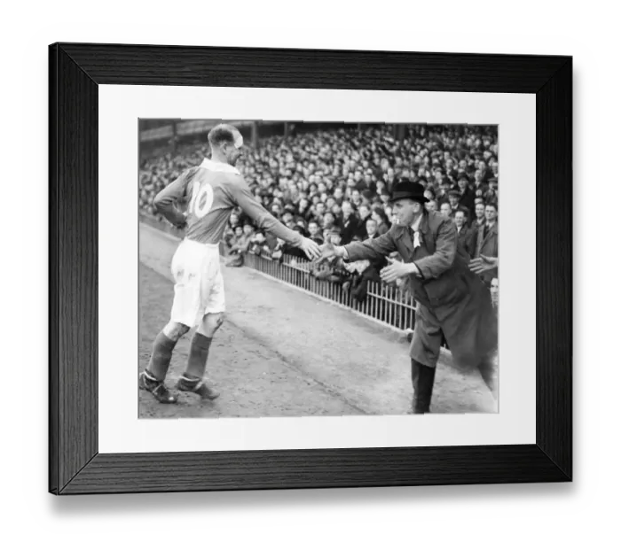 Framed Print : A Charlton supporter dashes out to shake hands with Don Welsh Framed Print : A Charlton supporter dashes out to shake hands with Don Welsh