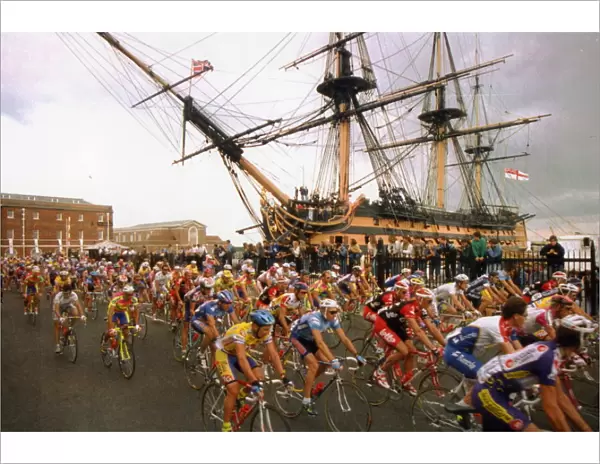 Tour de France cycle race passes through Portsmouth with HMS Victory in background