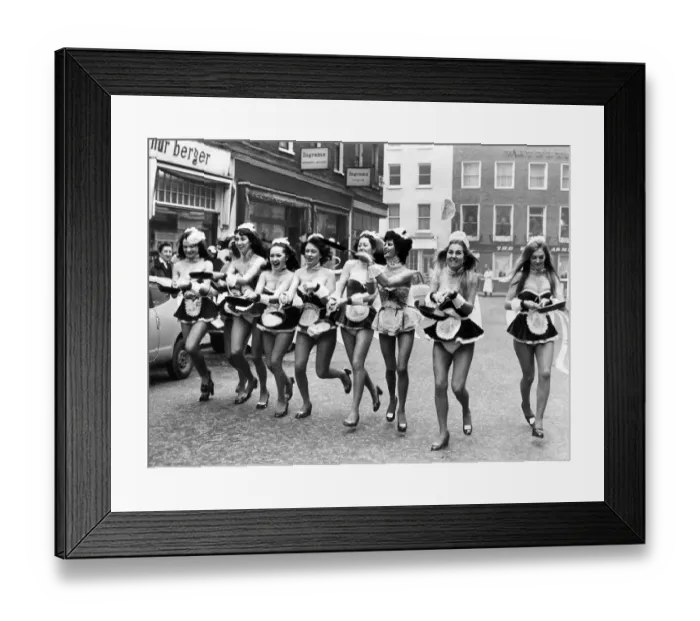Framed Print : Penthouse Pets in a pancake race in Shepherd market, London Framed Print : Penthouse Pets in a pancake race in Shepherd market, London