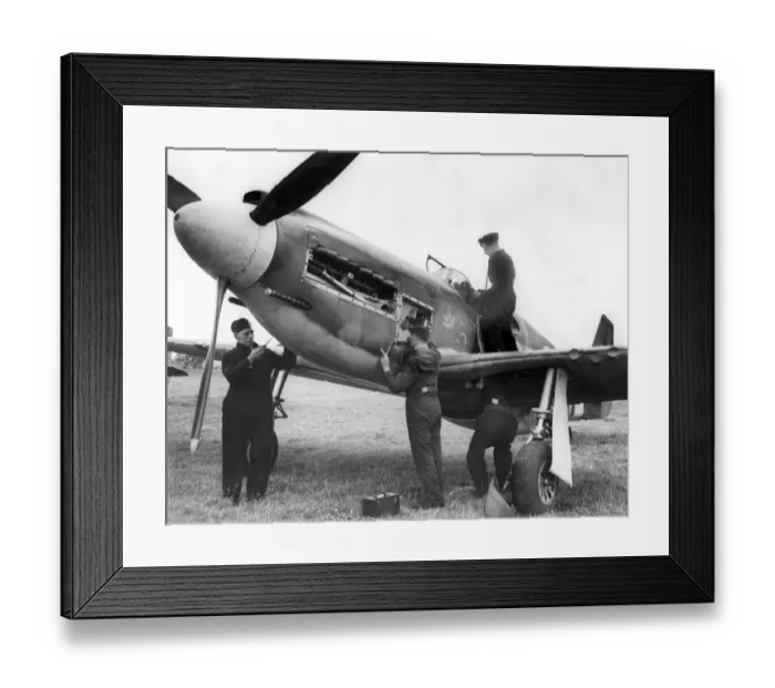 Framed Print : RAF mechanics working on an American Mustang aircraft