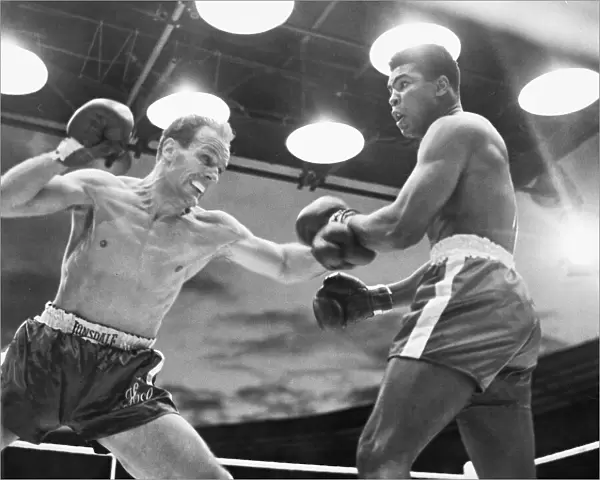 Muhammad Ali v Henry Cooper in a non-title fight at Wembley Stadium in 1963