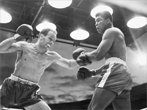 Muhammad Ali v Henry Cooper in a non-title fight at Wembley Stadium in 1963