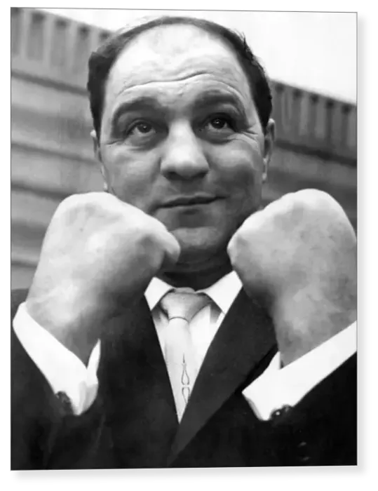 Print : Rocky Marciano undefeated former heavyweight champion of the world, arriving in London