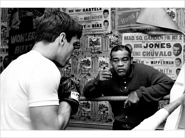 Former Boxer Joe Louis pictured at the Pigalle boxing club with