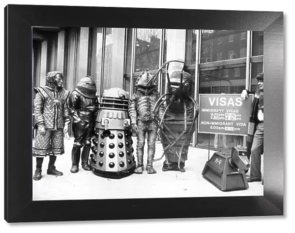 Actor Tom Baker as Dr Who, with his robot dog K-9, and assorted friends at the US Embassy 1978