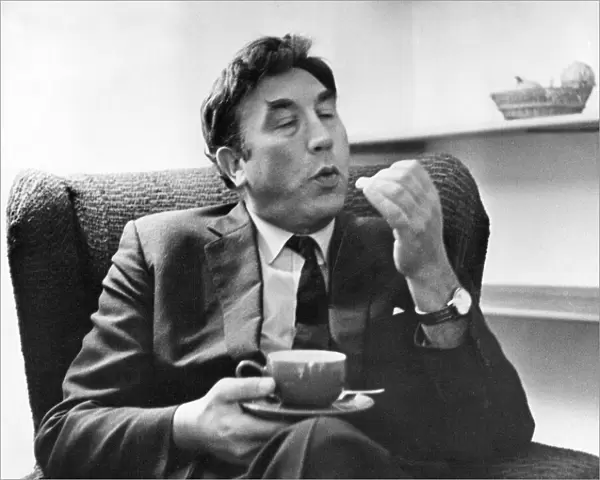 Frankie Howerd, with a cup of tea