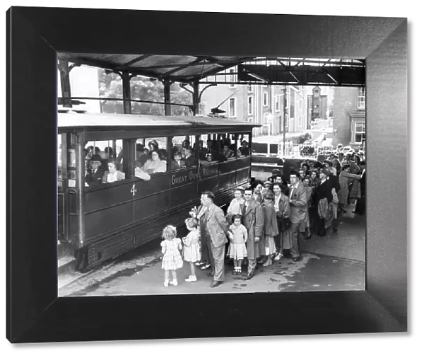 Holidaymakers queue for the Great Orme Tramway 1950