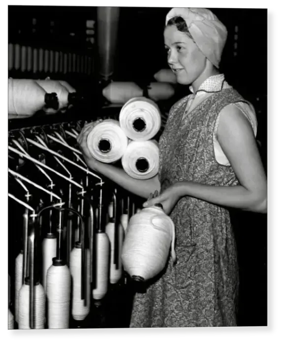 Print : A women worker at a cotton factory Print : A women worker at a cotton factory
