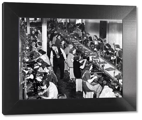 Women sewing army uniforms 1939