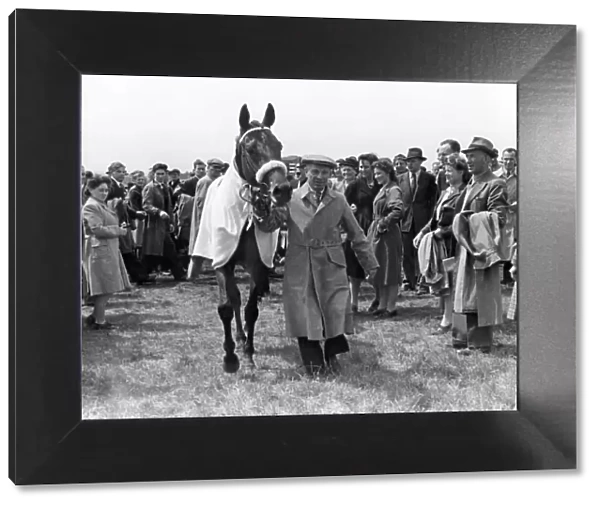 The Derby 1947. The winner, Pearl Driver, being led from the course